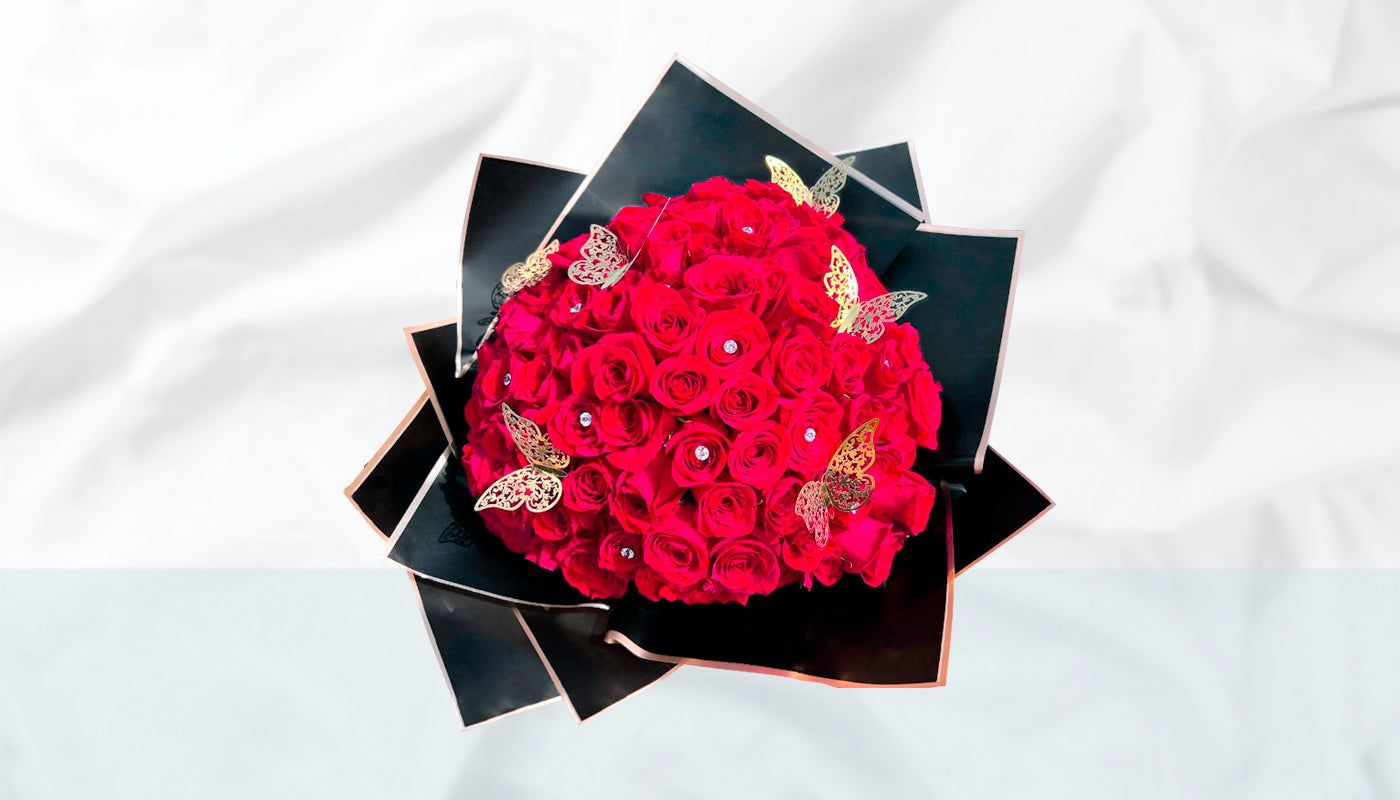 Wrapped Roses with diamonds and butterflies