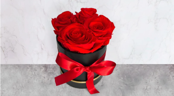 4 Eternal Roses in a black round box
