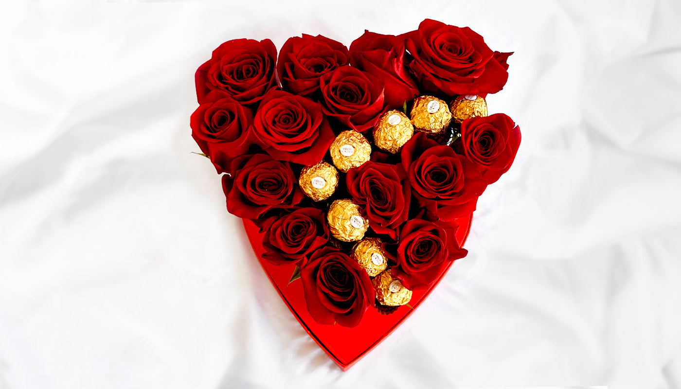Red roses with heart shape box