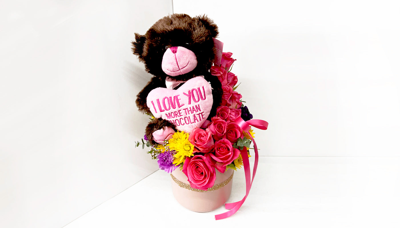 I love you more teddy bear in pink vase