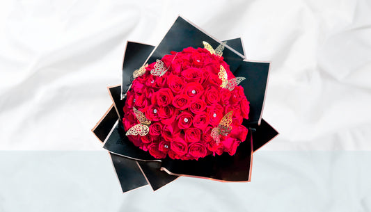 Wrapped Roses with diamonds and butterflies