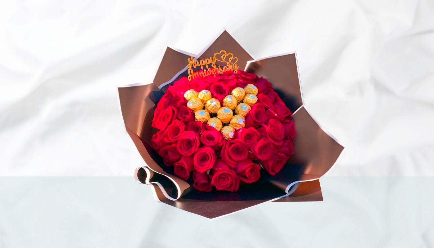 45 Roses with ferreros and occasion topper