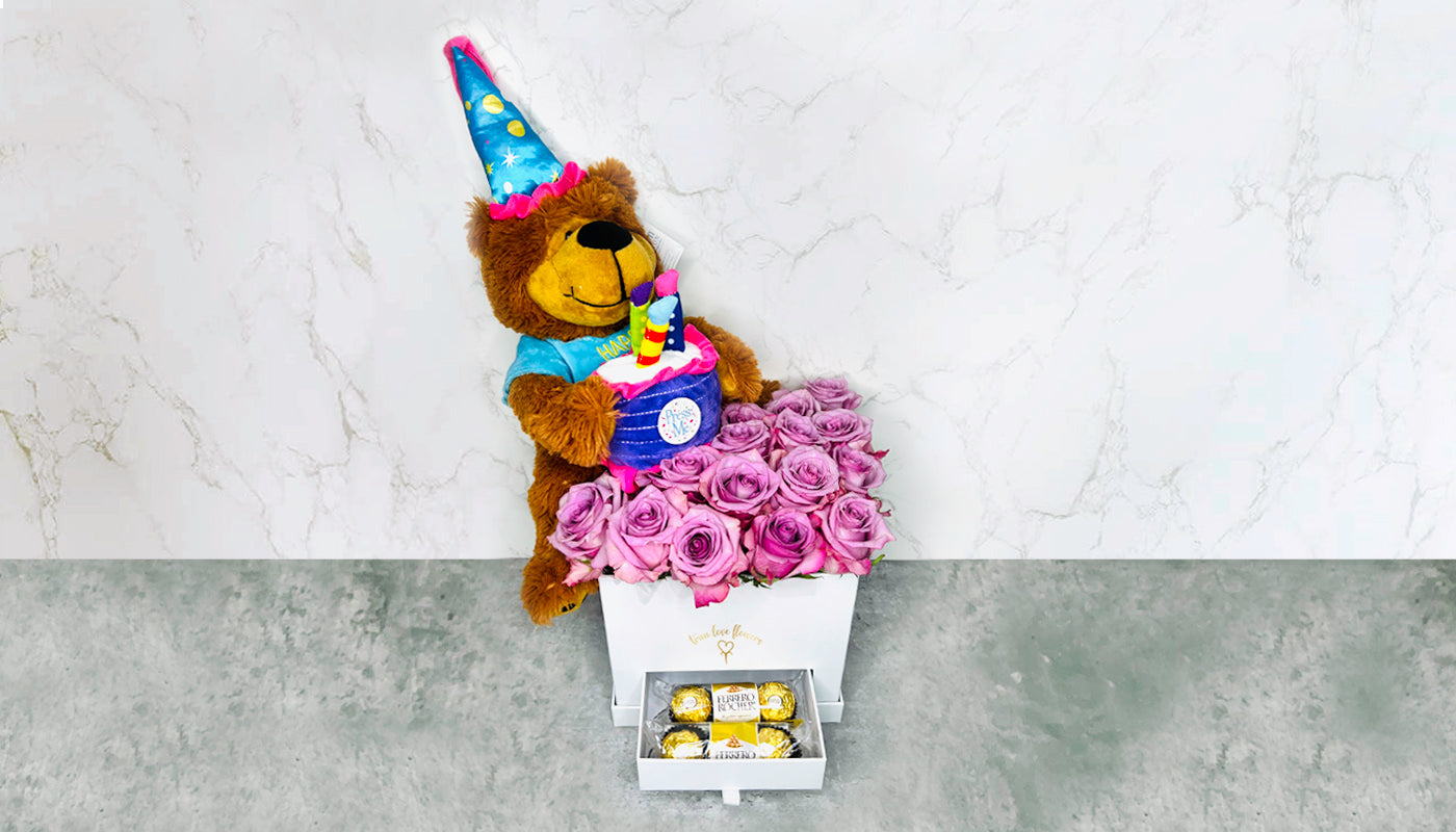 Big white flower box & happy birthday teddy bear.