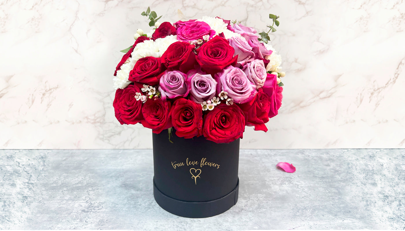 Mix of Flowers in Big Black box