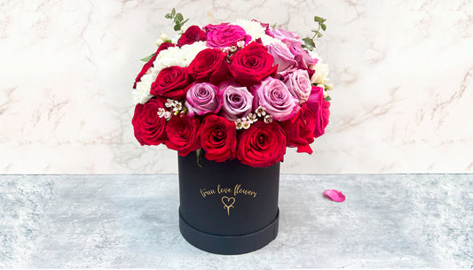 Mix of Flowers in Big Black box