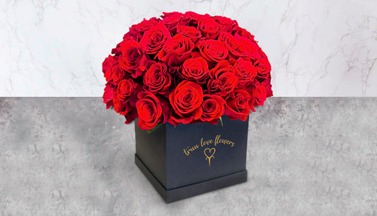 Square black box & red roses