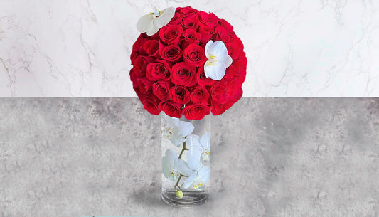 50 Roses in Glass Base