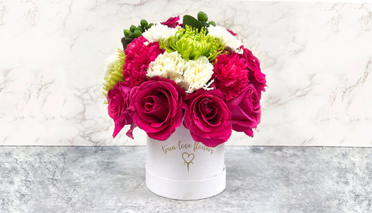 Mix of Flowers in White Box