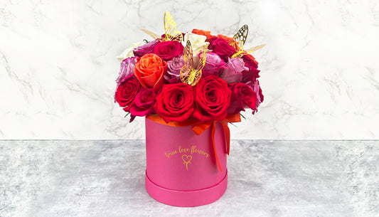 Beautiful 50 Roses & Hot Pink Box and butterflies