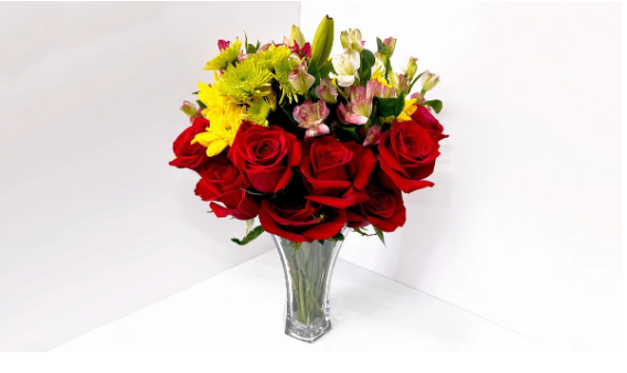 Long stem roses in glass vase